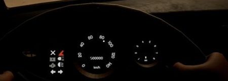 Red handbrake-shaped dashboard icon next to the speedometer